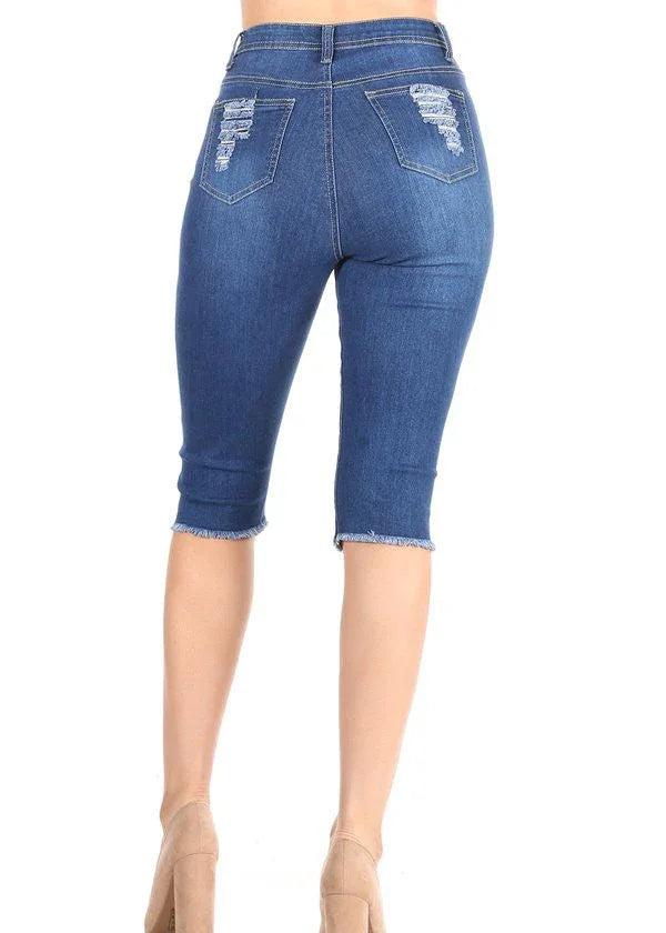 Blue denim capri jeans on a white background